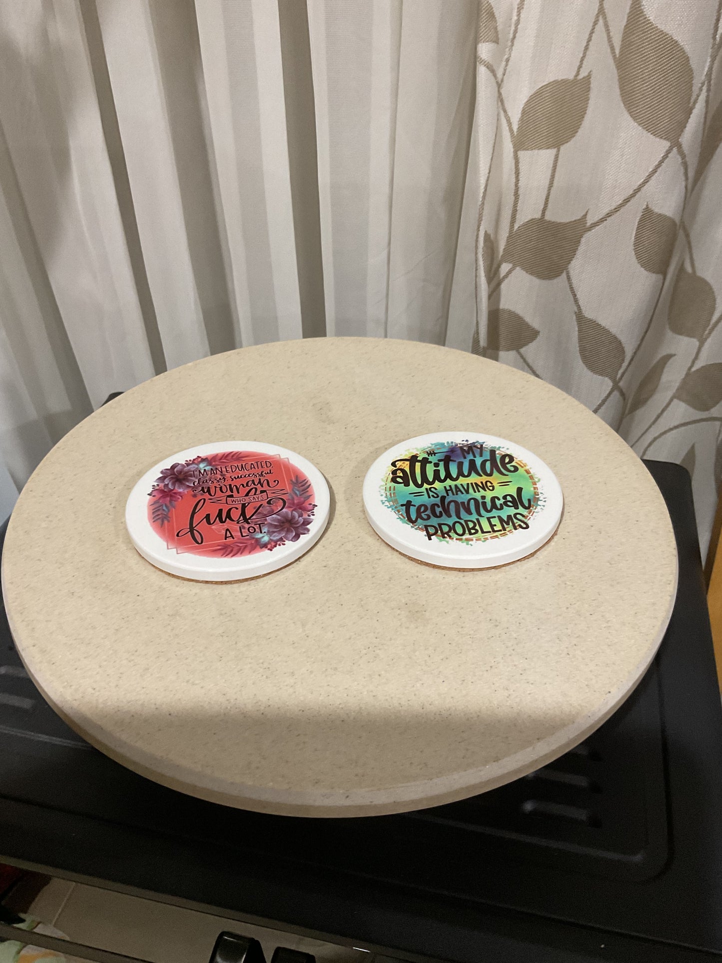 Red green coasters featuring swearing