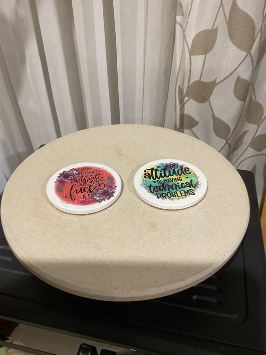 Red green coasters featuring swearing