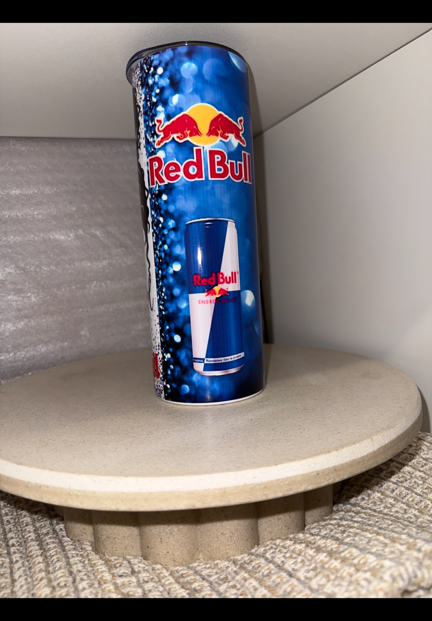 Red bull girl runs on red bull tumbler