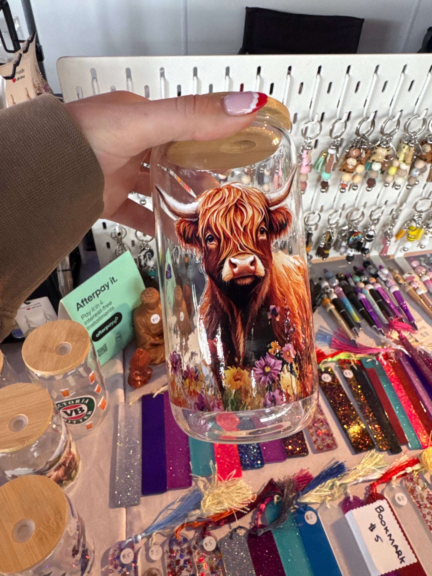 Highland cow in flowers with butterflies clear glass