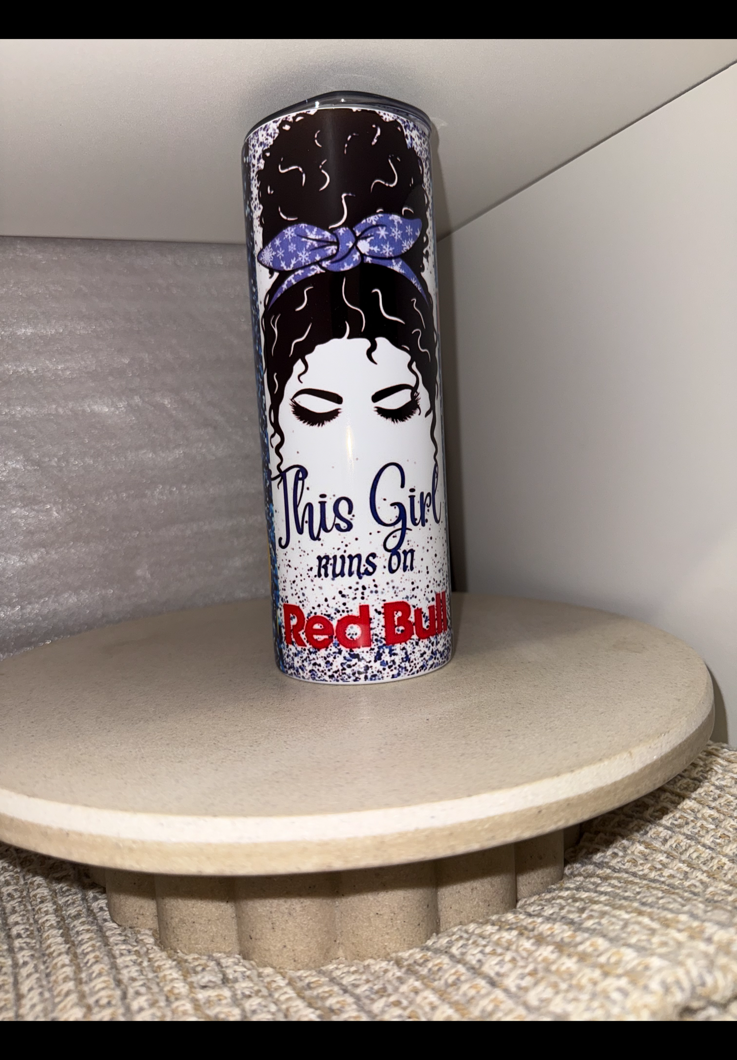 Red bull girl runs on red bull tumbler